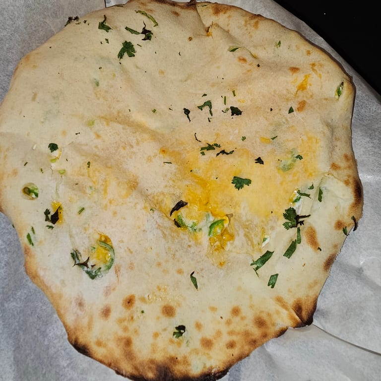 Delicious Naan Bread and Indian Cuisine Favorites